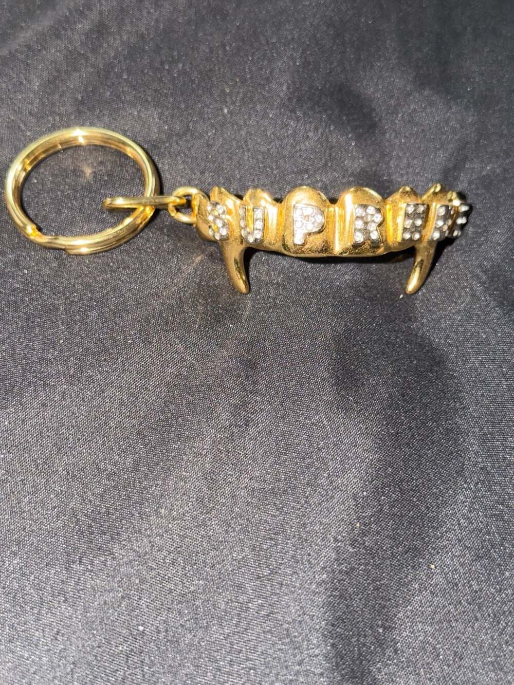 Supreme Fronts Keychain Gold Grill With Fangs